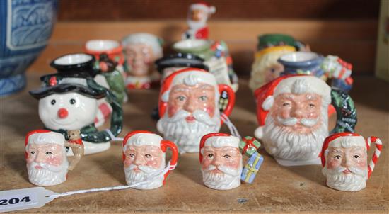 11 Royal Doulton Christmas-related miniature character jugs, 4 tiny Santa Claus jugs & a Bulldogs Santa Clause